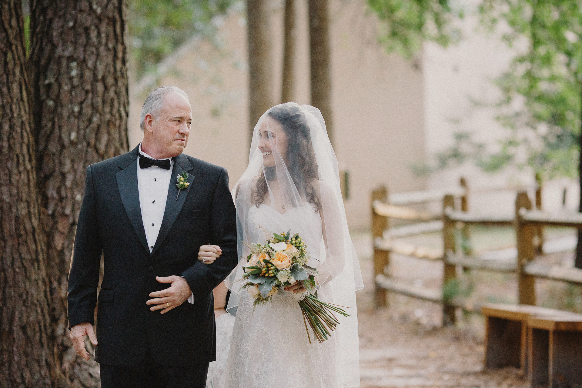 father walks bride down the isle