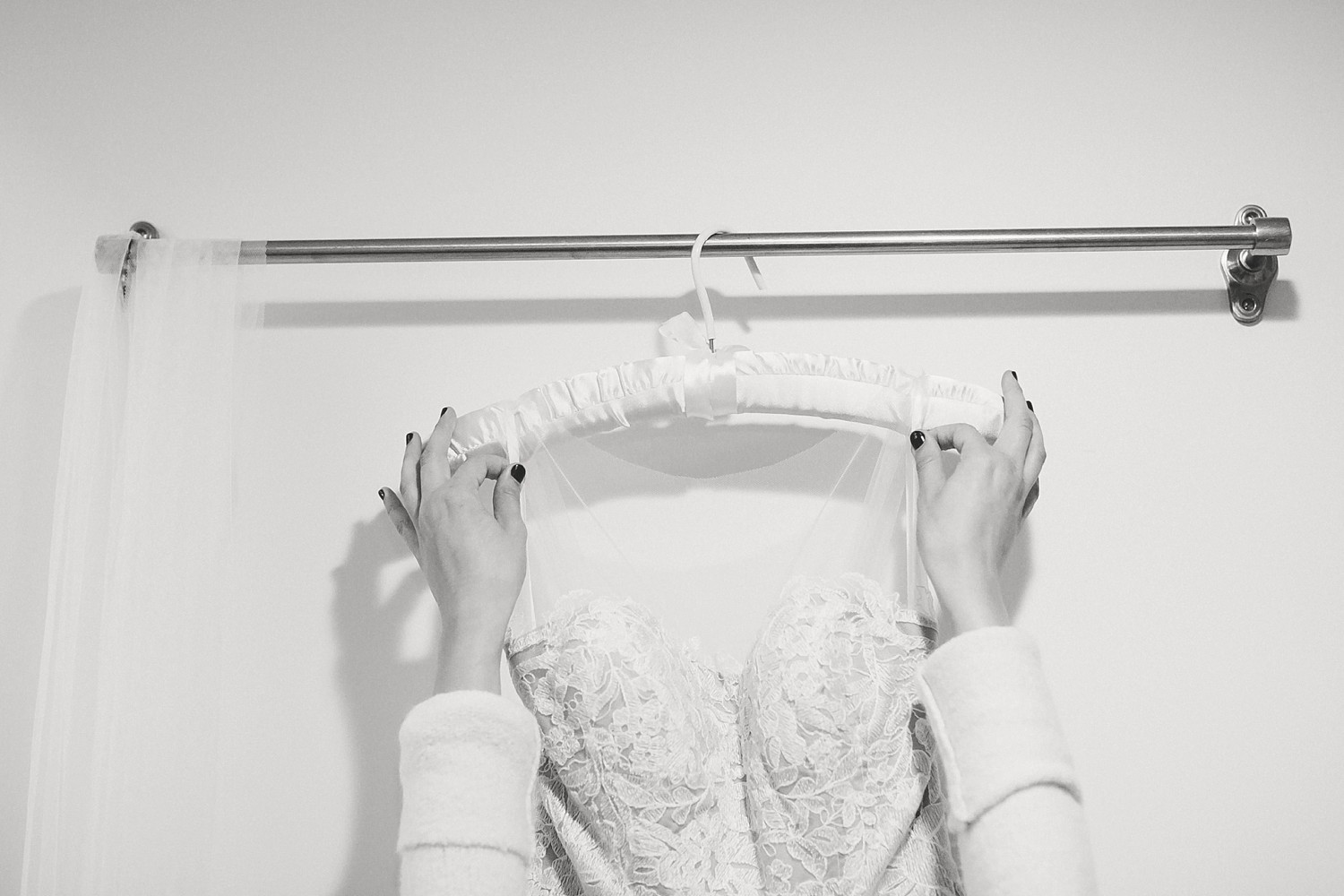 bride hanging dress